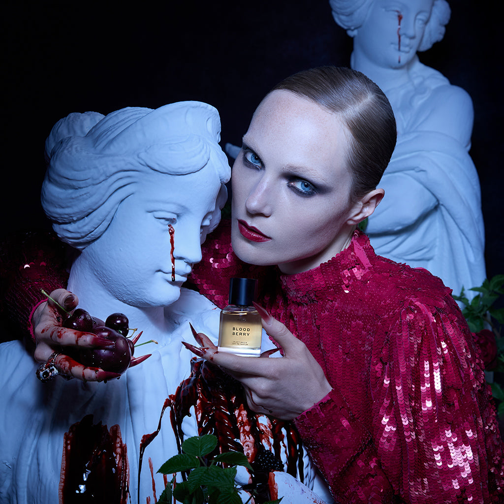 Model Holding Blood Berry