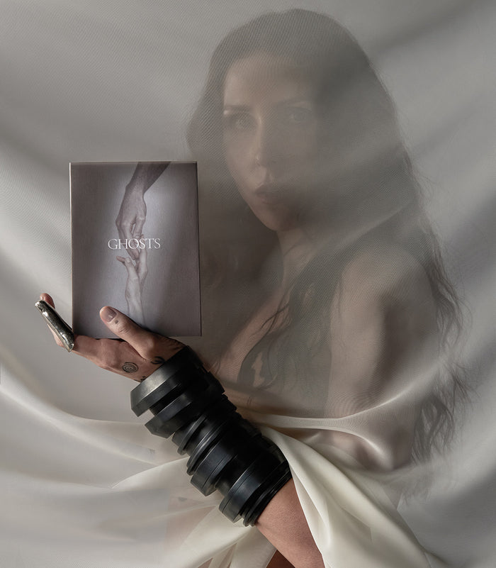 Chelsea Wolfe holding the Ghosts Discovery Set