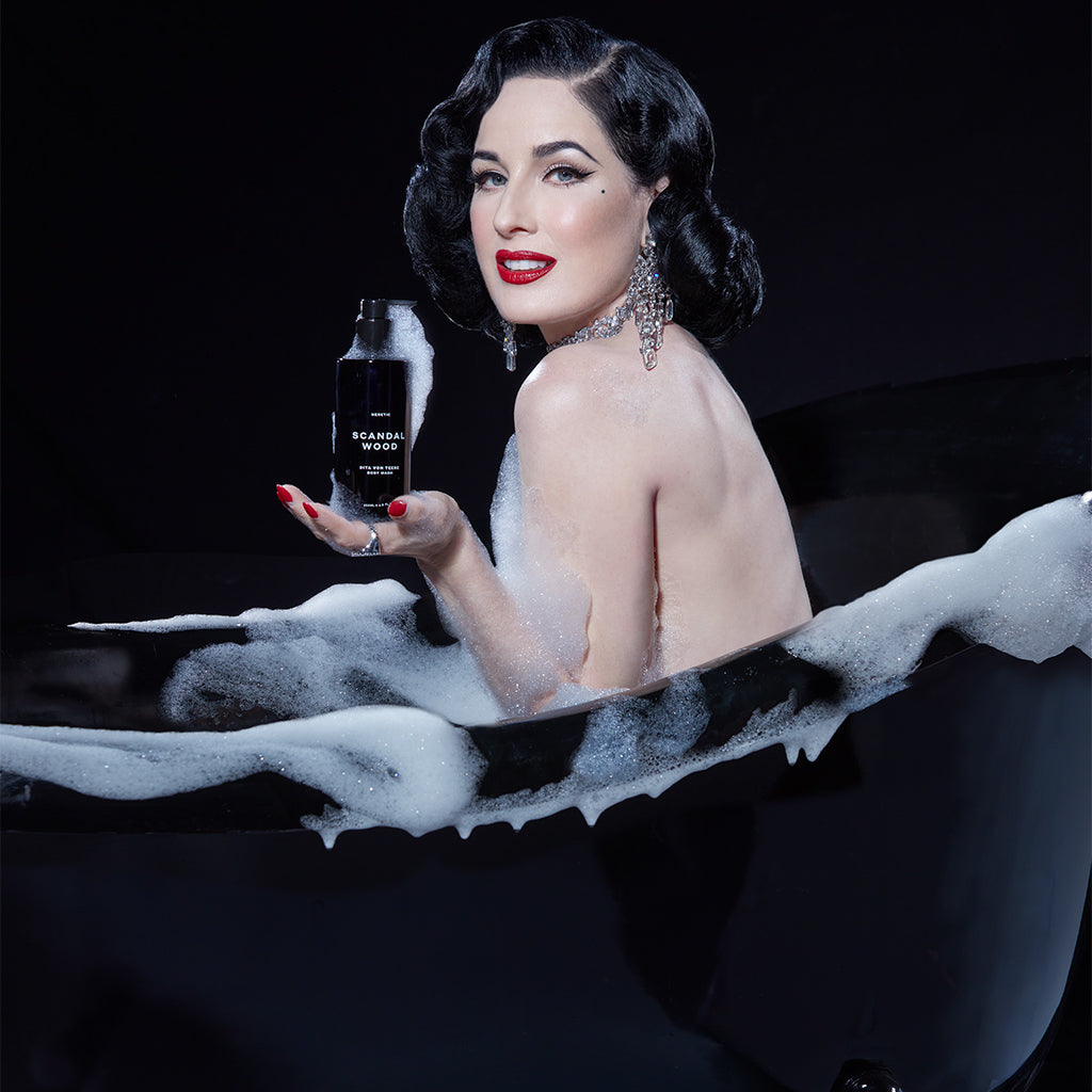 Dita Von Teese in tub with body wash