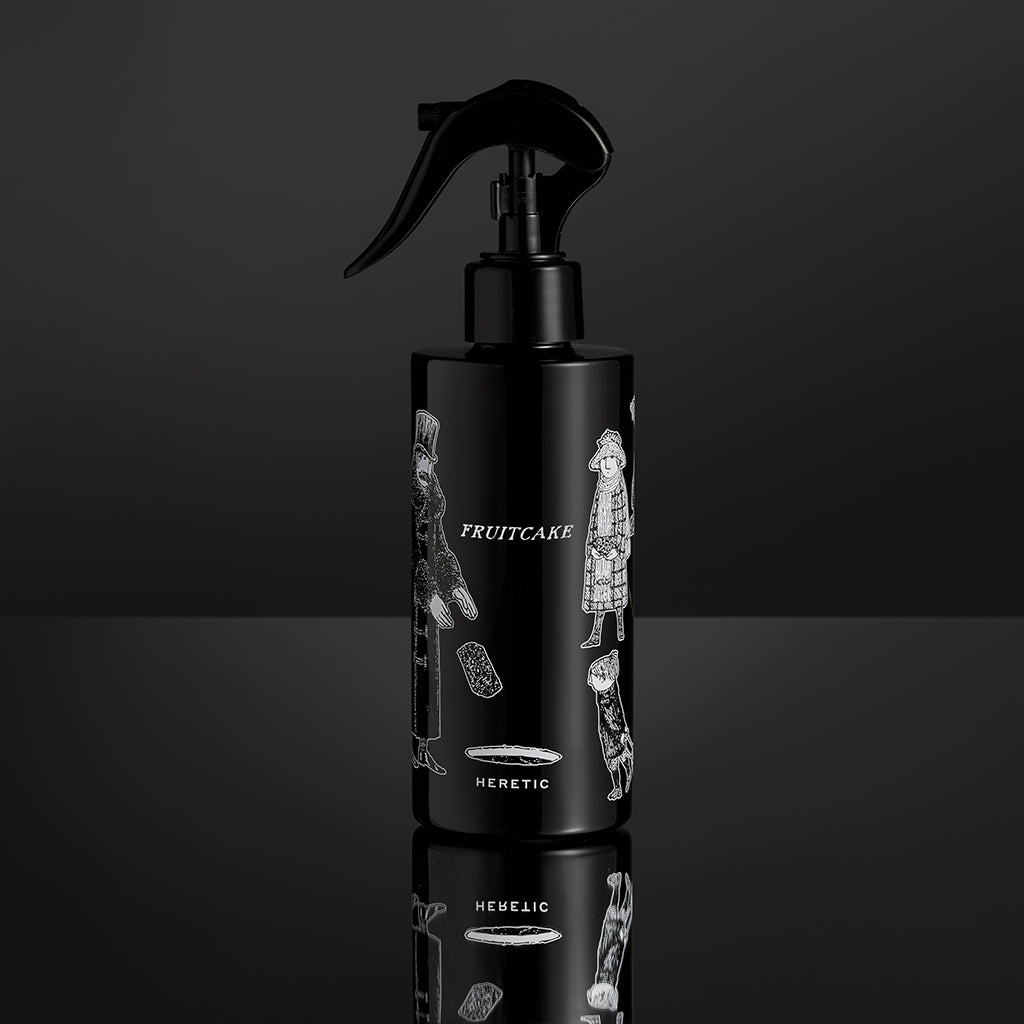 Fruitcake Room Spray on black background