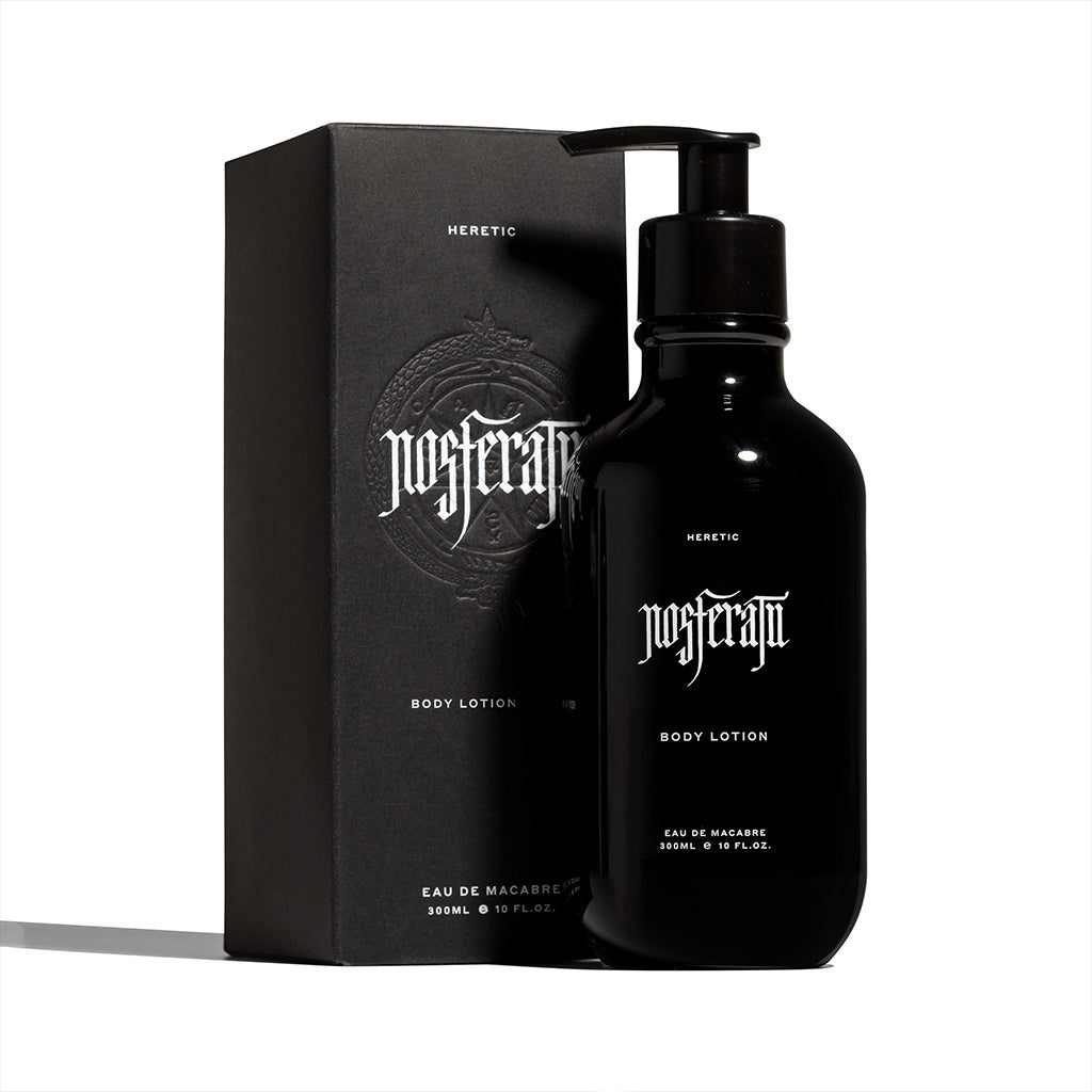 Black body lotion bottle and packaging with 'Heretic' branding on a white background