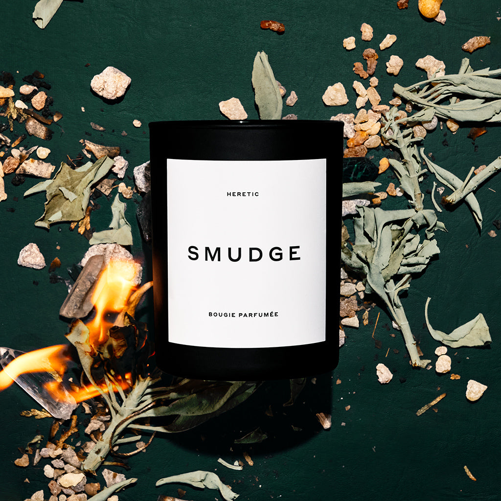 smudge candle with fire and smoke