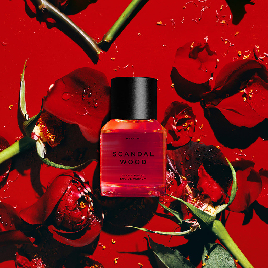 Scandalwood Perfume 50ml on a bed of roses