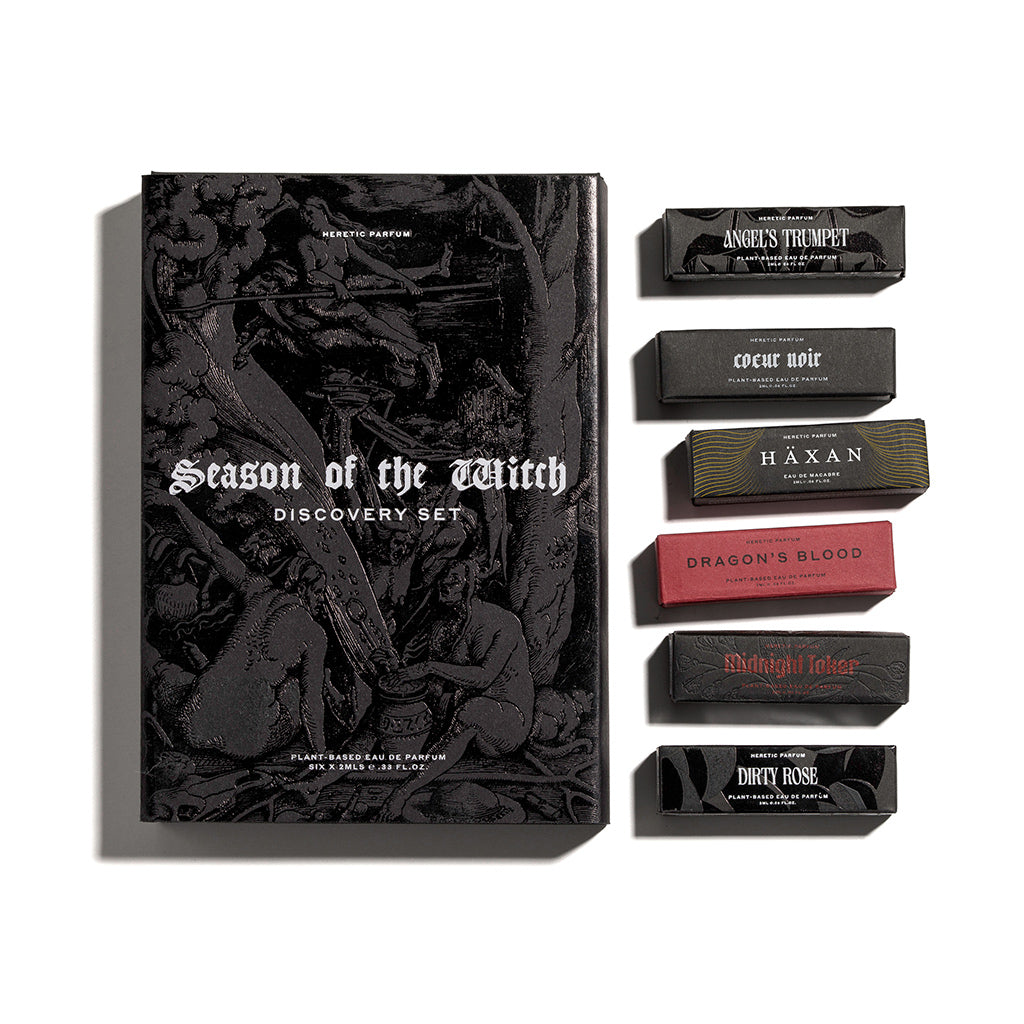 Season of the Witch perfume discovery set with black packaging and small bottles on a white background